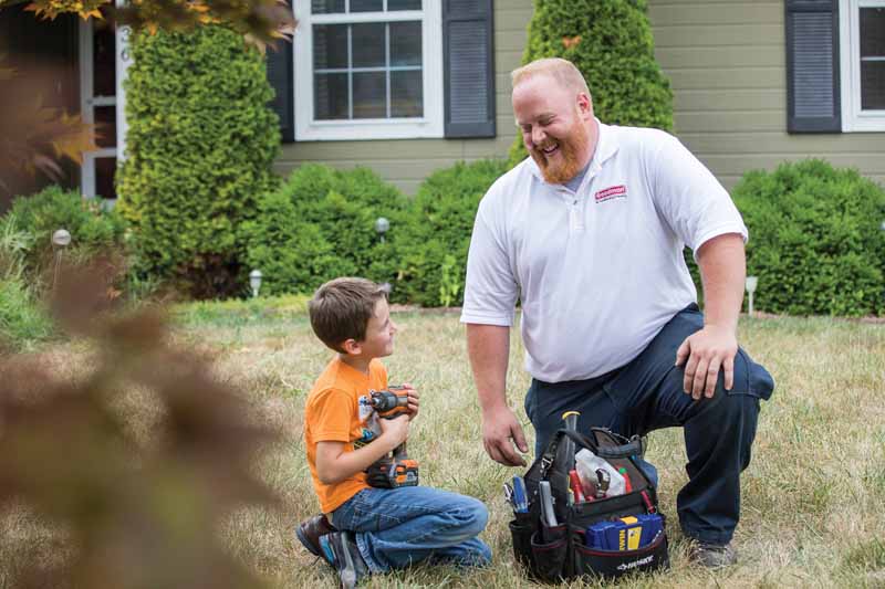 Community Support 1 dealer talking with child